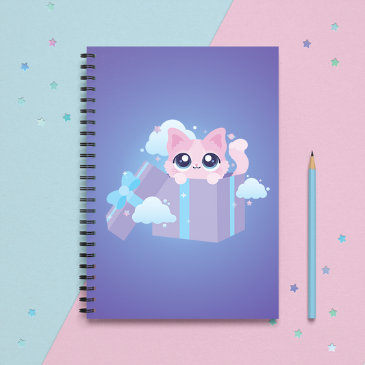 spiral notebook journal with a kawaii cute pink kitty cat in a purple gift box surrounded by small stars and planets
