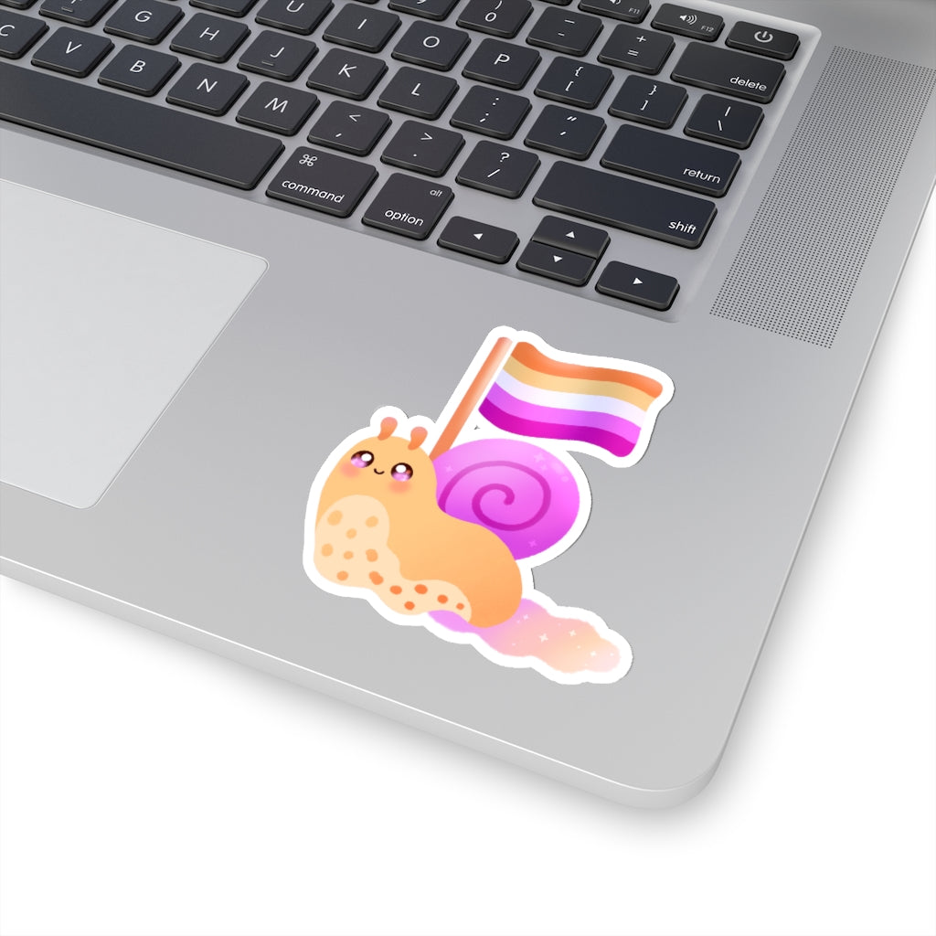 illustrated sticker of A cute kawaii orange, pink, and white snail with a LGBTQ Lesbian Pride Flag.