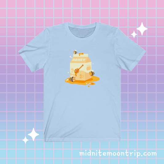 t-shirt with image of a kawaii milk carton full of honey with cute bees on a patel background
