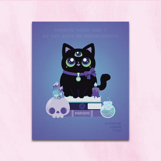 hanging art print of a 3-eyed black cat witch with a spooky crystal skull, a magic potion, and a melting candle sitting on a stack of spellbooks