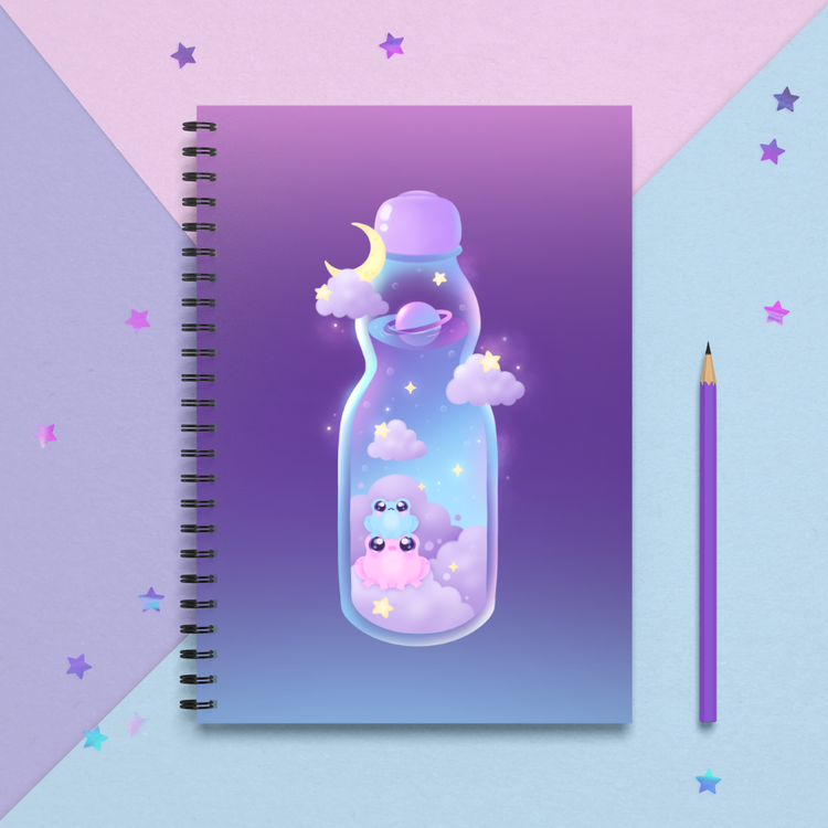 spiral notebook with cute frogs in a ramune bottle in outer space