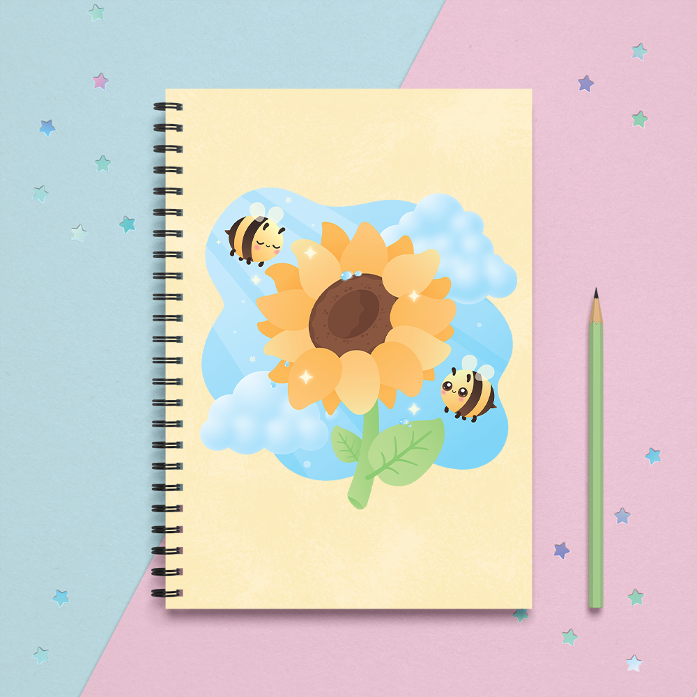 spiral notebook journal with two cute kawaii bees and a sunflower with fluffy clouds