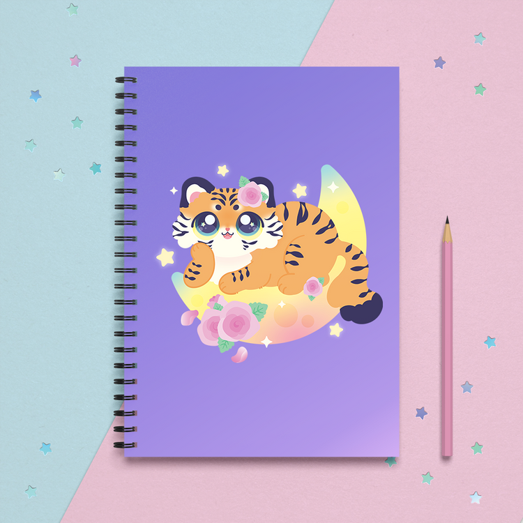 spiral notebook with a cute tiger lounges on a crescent moon with pink roses and stars