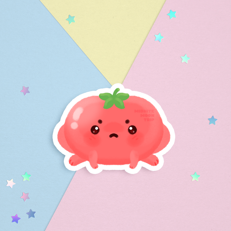 sticker of a cute grumpy red frog shaped like a tomato